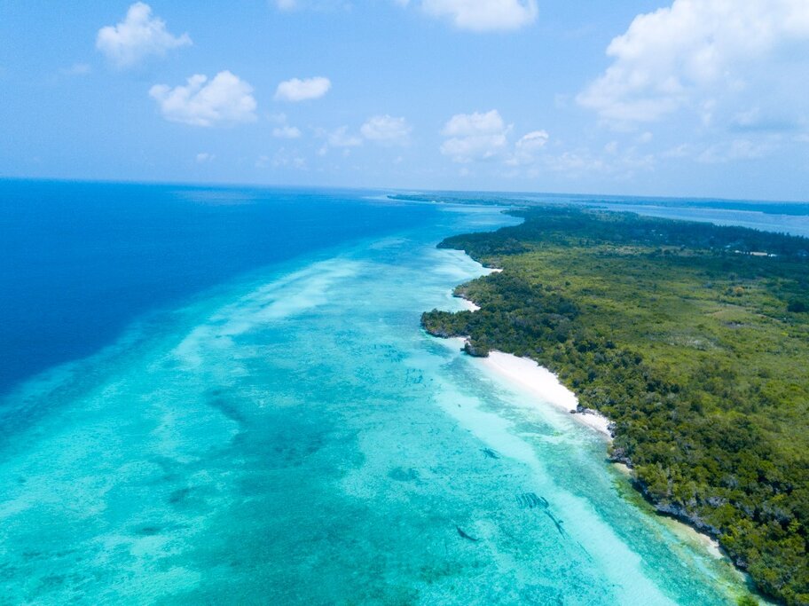 Zanzibar Island Unguja & Pemba Tanzania, Set like a jewel in tranquil coral waters, only 20 minutes flight from Dar es Salaam..